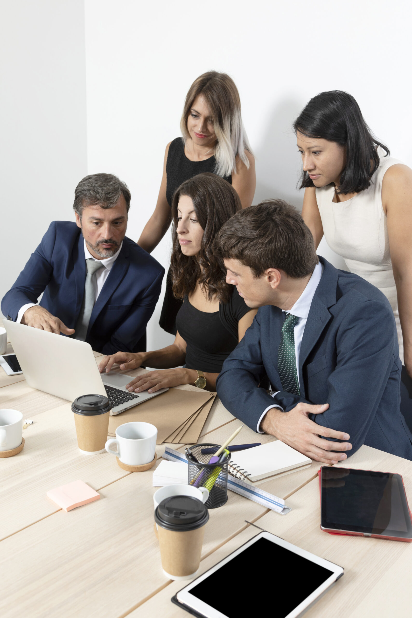 Group of Peoples looking in laptop